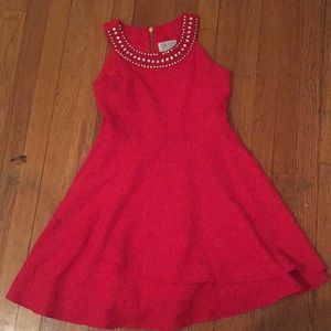 Barley worn, red dress with jewel neckline